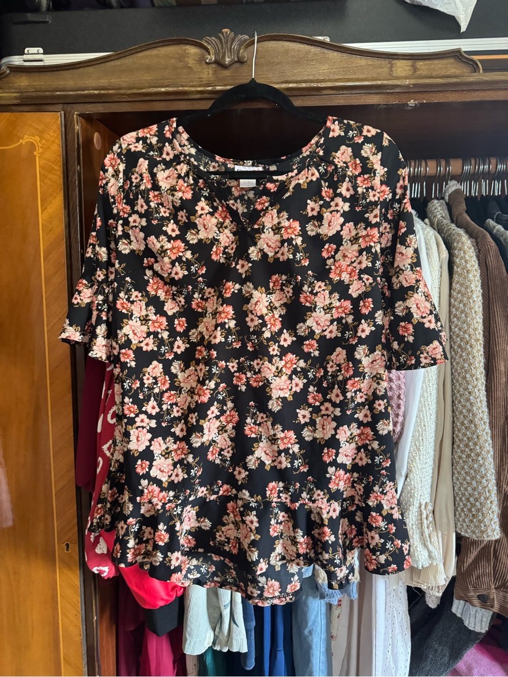 Black Floral Ruffle-Hem Blouse with Pink Blossoms